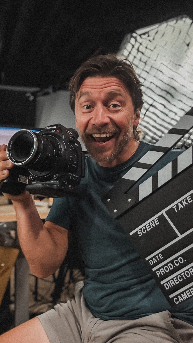Ryan Koral, founder of Studio Sherpas, with his camera